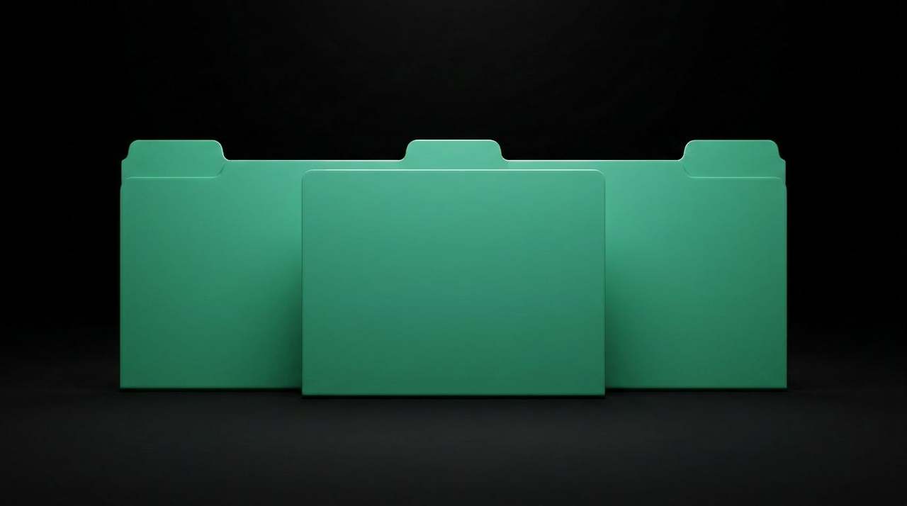 Glossy emerald-green lacquered branching coral-tree sculpture on a brass pedestal.